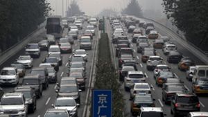 Obwohl die Straßen in Mega-Städten wie Peking verstopft sind, bleibt China ein Wachstumsmarkt. Foto: AP