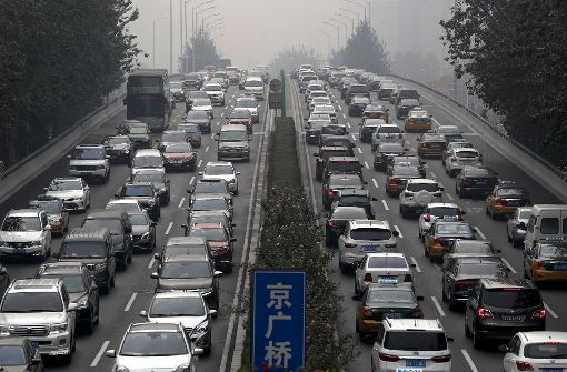 Obwohl die Straßen in Mega-Städten wie Peking verstopft sind, bleibt China ein Wachstumsmarkt. Foto: AP