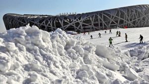 An dieses Bild muss man sich erst gewöhnen: Das Olympiastadion in Peking als Ort der Winterspiele Foto: dpa