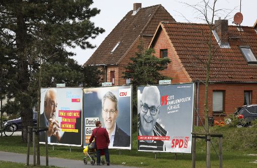 Wahlplakate in Kiel mit Wolfgang Kubicki (FDP), Daniel Günther (CDU) und Torsten Albig (SPD) Foto: dpa
