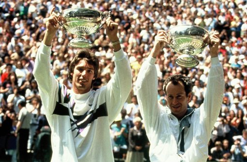 Im Jahr 1991 konnten Michael Stich (links) und John McEnroe beim MercedesCup den Titel im Doppel gewinnen. Am 7. Juli bestreiten die beiden Tennislegenden auf dem TC Weissenhof ein Showmatch zur Rasen-Premiere - und wir verlosen Karten. Foto: MercedesCup / Paul Zimmer