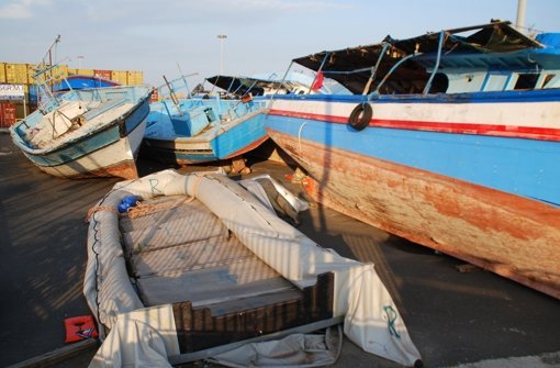 Beschlagnahmte Flüchtlingsboote im Hafen von Pozzallo auf Sizilien. Foto: dpa