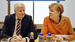 Zwei, die sich im Wahlkampf vertragen müssen: Angela Merkel und Horst Seehofer Foto: AFP