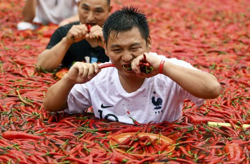 Nichts für Zartbesaitete: Chili-Wettessen in China. Foto: dpa
