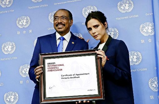 Der UN-Aids-Direktor Michel Sidibé (hier mit Victoria Beckham) ist „stolz auf Afrika“. Foto: EPA