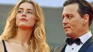 Die blonde Schönheit und der coole Hund: Amber Heard und Johnny Depp in besseren Zeiten Foto: dpa