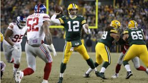 Ein Mann für magische Momente: Aaron Rodgers von den Green Bay Packers (Nummer 12) Foto: AP