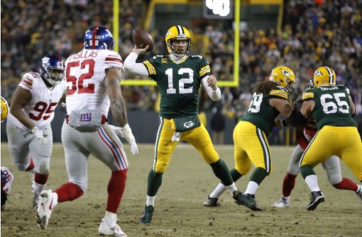 Ein Mann für magische Momente: Aaron Rodgers von den Green Bay Packers (Nummer 12) Foto: AP