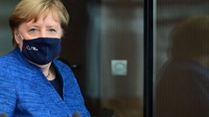 Bundeskanzlerin Angela Merkel wird mit den OBs der größten Städte in Deutschland sprechen. Foto: AFP/JOHN MACDOUGALL