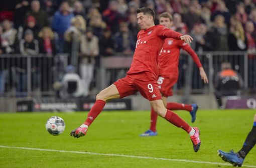 Torjäger Robert Lewandowski schlägt für die Bayern zu. Foto: AFP/GUENTER SCHIFFMANN