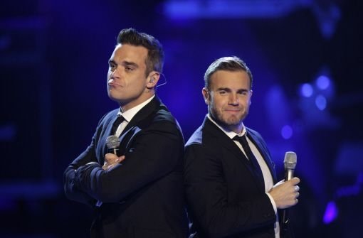 Sie können nicht mit und offenbar auch nicht ohne einander: Robbie Williams (links) und Gary Barlow. Foto: dpa