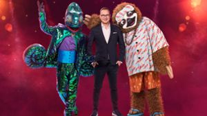 Das Chamäleon und das Faultier werden in der neuen Staffel der ProSieben-Sendung The Masked Singer auftreten. Foto: dpa/ProSieben