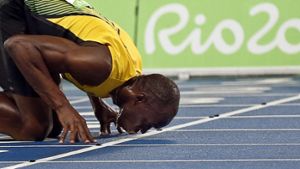 Usain Bolt feiert sein Gold über 200 Meter. Foto: EPA