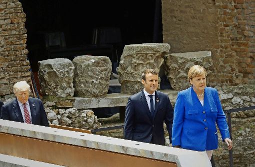 Kein Schulterschluss mehr: US-Präsident  Trump (links) hat Partner wie Frankreichs Präsidenten Macron und Bundeskanzlerin Merkel verprellt. Foto: AFP