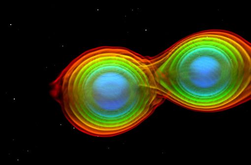 Numerisch-relativistische Simulation zweier einander umkreisender und verschmelzender Neutronensterne. Dargestellt sind die Dichteverteilungen der beiden Neutronensterne bei der Kollision. Foto: dpa/Max-Planck-Institut für Gravitat