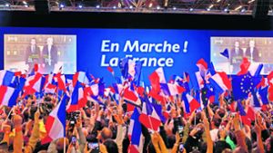 Die Anhänger des parteilosen Präsidentschaftskandidaten Emmanuel Macron jubeln nach den ersten Hochrechnungen am Sonntagabend. Foto: Getty