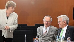 Neue Regeln für Firmenerben? Schäuble (li.) und Kretschmann droht innerparteilicher Streit. Foto: dpa