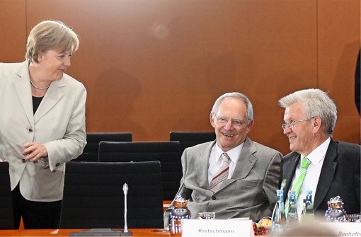 Neue Regeln für Firmenerben? Schäuble (li.) und Kretschmann droht innerparteilicher Streit. Foto: dpa
