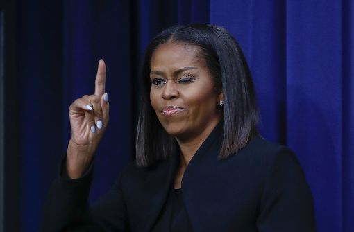 Sie zählt zu den Menschen, die in diesem Jahr auf sich aufmerksam gemacht haben: Michelle Obama. In unserer Bildergalerie sehen sie weitere Menschen des Jahres. Klicken Sie sich durch. Foto: AP