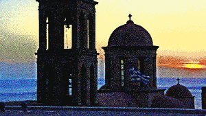 Vor der untergehenden Sonne bilden die Türme des Klosters Gonia einen stimmungsvollen Kontrast. Foto: Win Schumacher