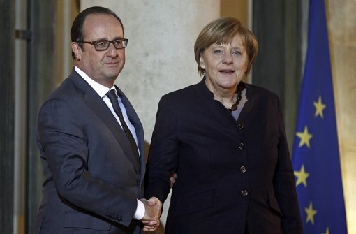 Bundeskanzlerin Angela Merkel  mit dem französischen Staatspräsidenten François Hollande Foto: Getty Images Europe
