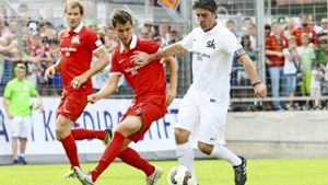Spiel des Jahres Jens Lehmann (li.) und Joachim Löw (re.) mit Nicolas Helbling Foto: Baumann