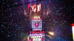 Auf dem New Yorker Times Square begrüßten zahlreiche Menschen das neue Jahr.  Foto: AP