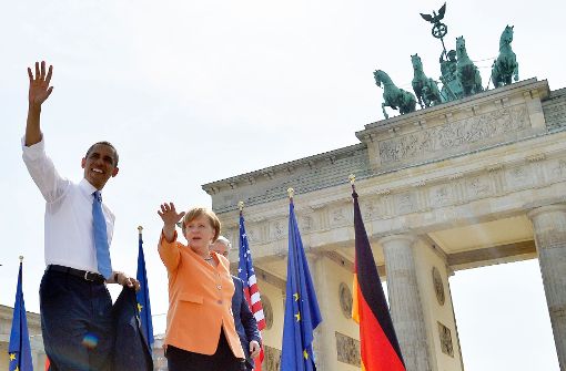 Historischer Besuch am 19. Juni 2013: Barack Obama und Angela Merkel vor dem Brandenburger Tor. Foto: AFP