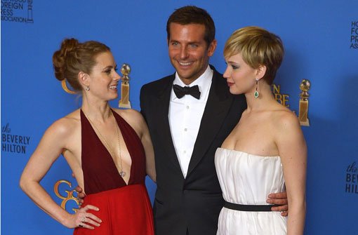 Amy Adams, Bradley Cooper und Jennifer Lawrence (rechts) kommen im Februar zur Berlinale in Berlin. Foto: dpa
