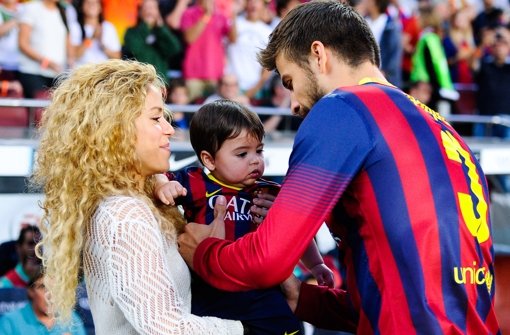 Sängerin Shakira und ihr Partner, Fußballstar Piqué vom FC Barcelona, mit ihrem Sohn Milán, der im Januar 2013 geboren wurde. Das Paar erwartet nun das zweite Kind. Foto: Getty Images Europe