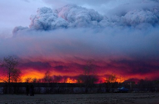 Zehntausende Menschen sind in Kanada bereits auf der Flucht vor den Flammen. Foto: AP