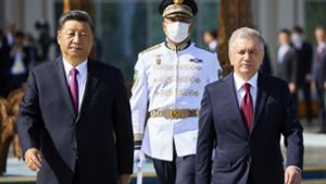 Usbekistans Präsident Mirziyoyev  und sein chinesischer Kollege Xi. Foto: dpa/Uncredited