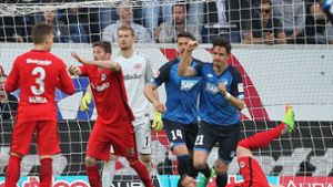 Benjamin Hübner schießt die TSG 1899 Hoffenheim zum Sieg gegen Eintracht Frankfurt. Foto: AFP
