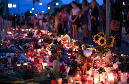 Die Menschen in München trauern um die Opfer des Amoklaufs. Foto: dpa