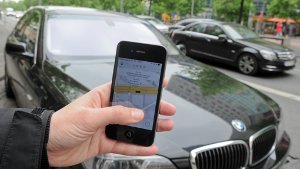 Die Handy-App Uber ist der Taxi-Branche ein Dorn im Auge. Foto: dpa