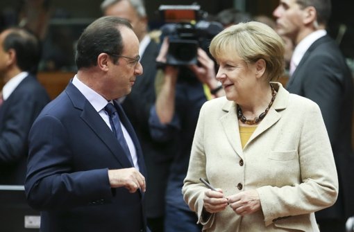 Der französische Präsident Hollande und Bundeskanzlerin Merkel wollen sich in Sachen Ukraine-Krise mit Wladimir Putin und Petro Poroschenko treffen. Foto: dpa