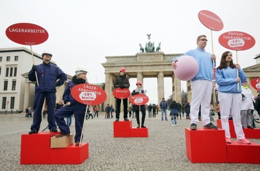 In vielen Städten gibt es anlässlich des Equal Pay Day Aktionen – so wie hier in Berlin. Foto: dpa