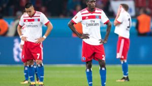 Hängende Köpfe bei den Spielern des Hamburger SV Foto: dpa