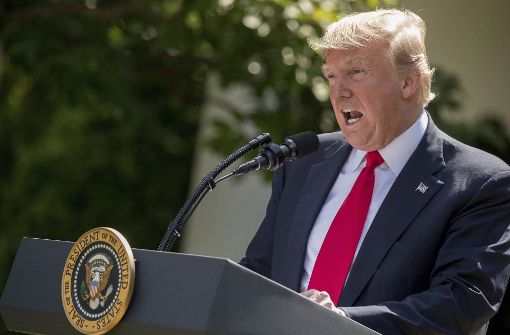 Im Rosengarten des Weißen Hauses hat US-Präsident Donald Trump seine weitreichende Entscheidung zur Klimapolitik verkündet. Foto: AP