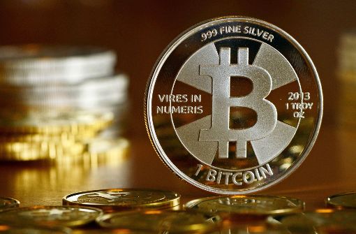 Bitcoins sind eigentlich virtuelle Münzen, dies ist praktisch ein Gutschein. Foto: dpa