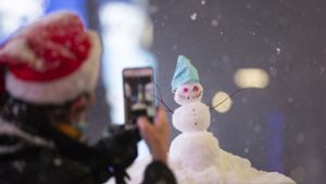 Ob auch an Weihnachten Schneemänner gebaut werden können? Foto: dpa/Wang Ying