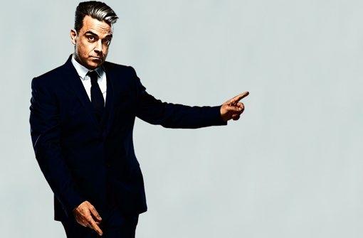 Der britische Popstar Robbie Williams singt auf seinem  Album „Swings Both Ways“ auch für seine Tochter. Foto: Universal