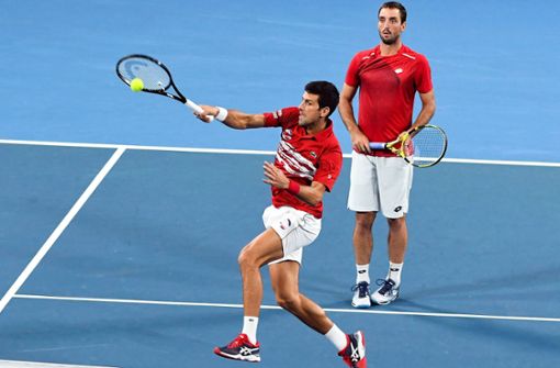 Viktor Troicki (hinten) und Novak Djokovic im Doppel gegen Spanien. Foto: AFP/WILLIAM WEST