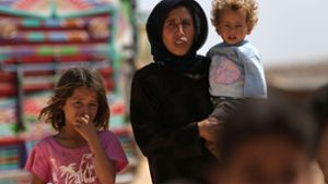Nur weg von Idlib: Flüchtlinge an der syrisch-türkischen Grenze Foto: AFP