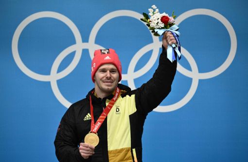 Christoph Grotheer gewinnt die Skeleton-Goldmedaille. Foto: AFP//JEFF PACHOUD