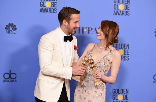 Die Musical-Romanze „La La Land“ ist der große Gewinner der Golden Globes. Der Film mit Emma Stone und Ryan Gosling sahnte sieben Preise ab. Foto: AFP
