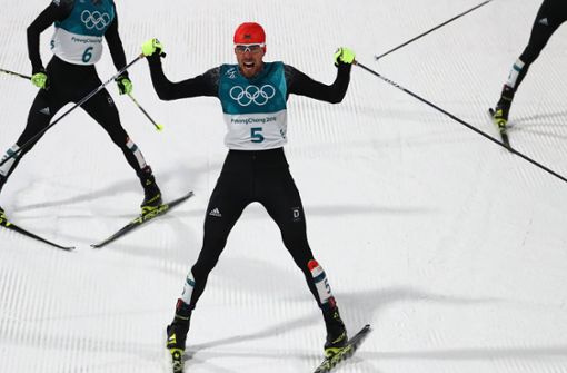 Der Nordische Kombinierer Johannes Rydzek (Mitte) holte bei den Olympischen Winterspielen 2018 in Pyeongchang Gold für Deutschland. Foto: dpa/Daniel Karmann