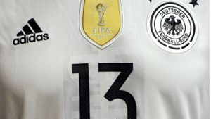 Adidas derzeit mit dem Deutschen Fußball Bund (DFB) über eine Verlängerung des Ausrüstervertrags für die Jahre nach 2019 Foto: dpa