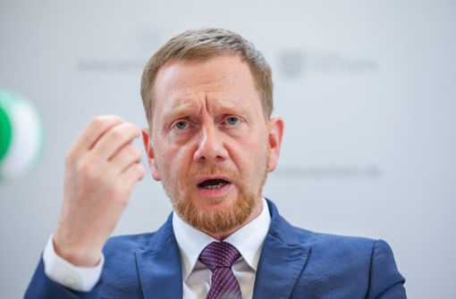 Sachsens Ministerpräsident Michael Kretschmer reagiert auf die Debatte. Foto: dpa/Jan Woitas