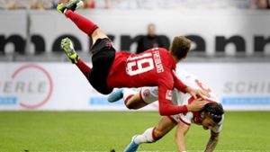 Derzeit die Überflieger in der Fußball-Bundesliga: Janik Haberer (l.) und der SC Freiburg. Foto: AFP/Ina Faßbender